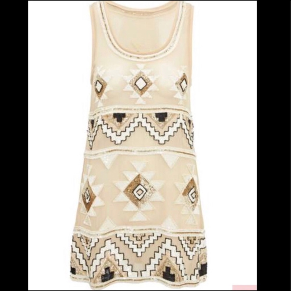 Needle and thread beaded dress